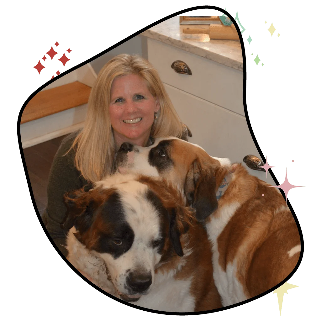 Molly playing with her two dogs winston and faith in their kitchen with a blob shape outlining the image